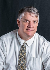 headshot of Greg McLean