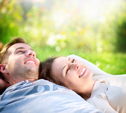 man and woman smiling
